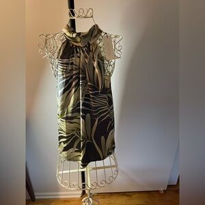 Flowy top, light, ties in the back. NWT